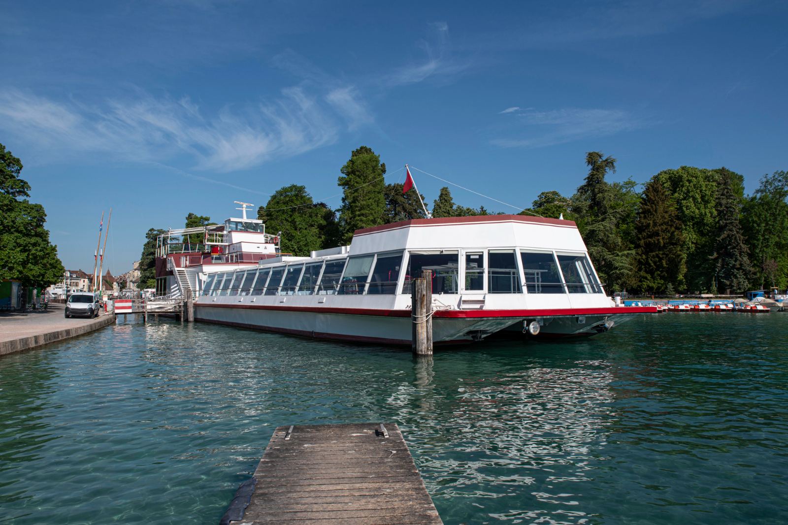 Compagnie des Bateaux cruise boat moored at the pier on Lake Annecy